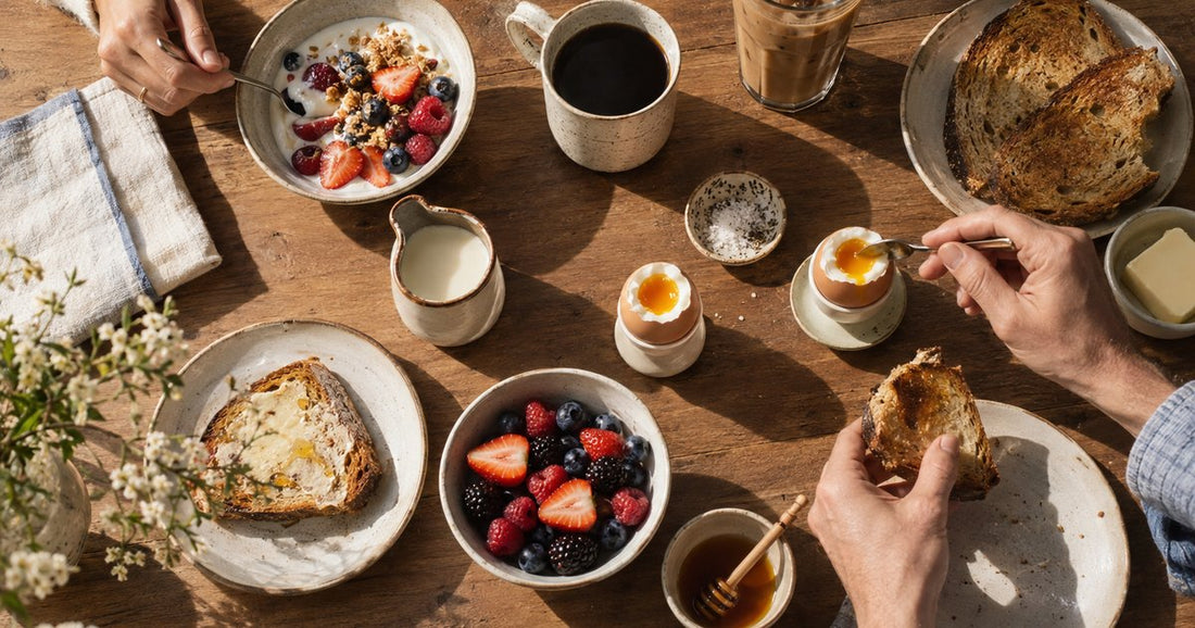 A high-protein breakfast of eggs and Greek yoghurt beside a glass of iced protein coffee