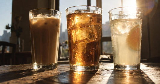 Three glasses showing whey, clear whey and collagen side by side with their powders